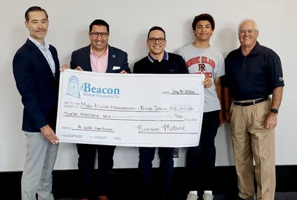 Beacon Mutual Supports Make-A-Wish with Donation and Backpacks